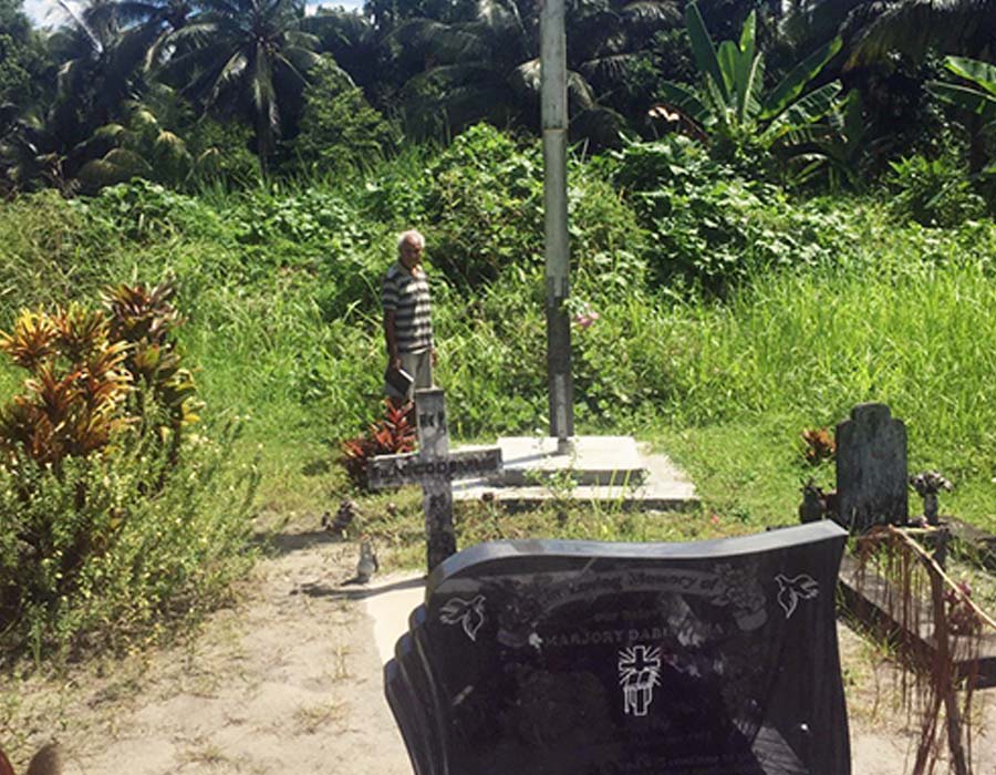 The site of the first Church at Gona. The Wooden Cross is all that remains, and still has bullet holes from the Japanese invasion. The current Church of the Holy Cross is a little further inland. © Jeffrey Driver, 2018.