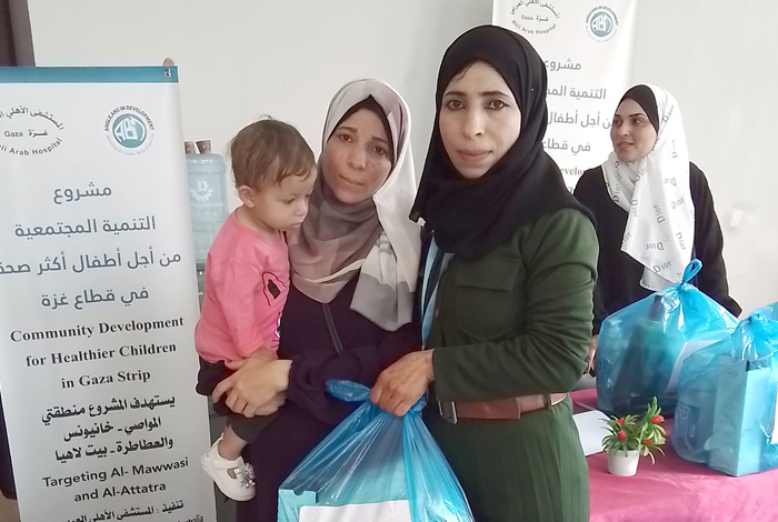 Rayan with Fedaa, the community mobiliser who worked with her on building self-esteem and other skills ©Al-Ahli Hospital, Gaza