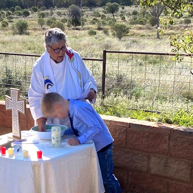 Gloria presides at a baptism in the bush ©Rev’d Gloria Shipp
