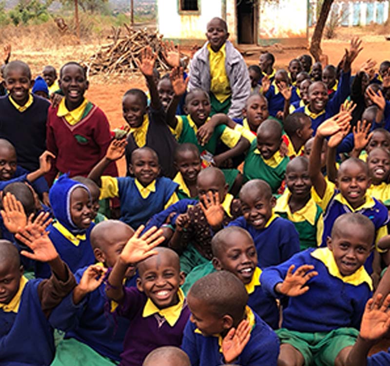 These Kenyan primary school children have benefited from the project. © Julianne Stewart/ABM, 2018.