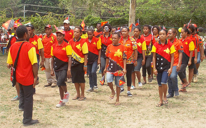 Level 4 Adult Literacy class marching at Independence Day celebrations