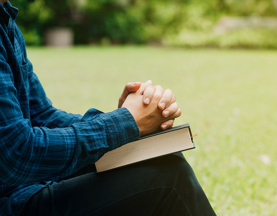 Hands clasped on a bible, Missional prayer resources