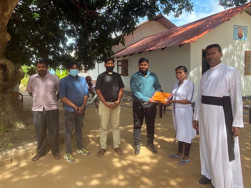 Village officers in Sri Lanka giving church volunteers the names of the most vulnerable households © Church of Ceylon.