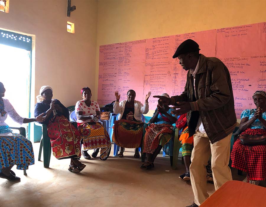 Benjamin Molimalawa, Chair of Kyumbuke CBO Management Committee, addresses a meeting Oct 2018