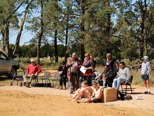 Opening ceremony and opening of Winangali Walk (“to hear, listen”) “Heal Country”. Gloria is seated next to Mayor of Nyngen, Ray Donald, November 2021. © Maryann McDougall, Marea Johnson and Amber Dutton.