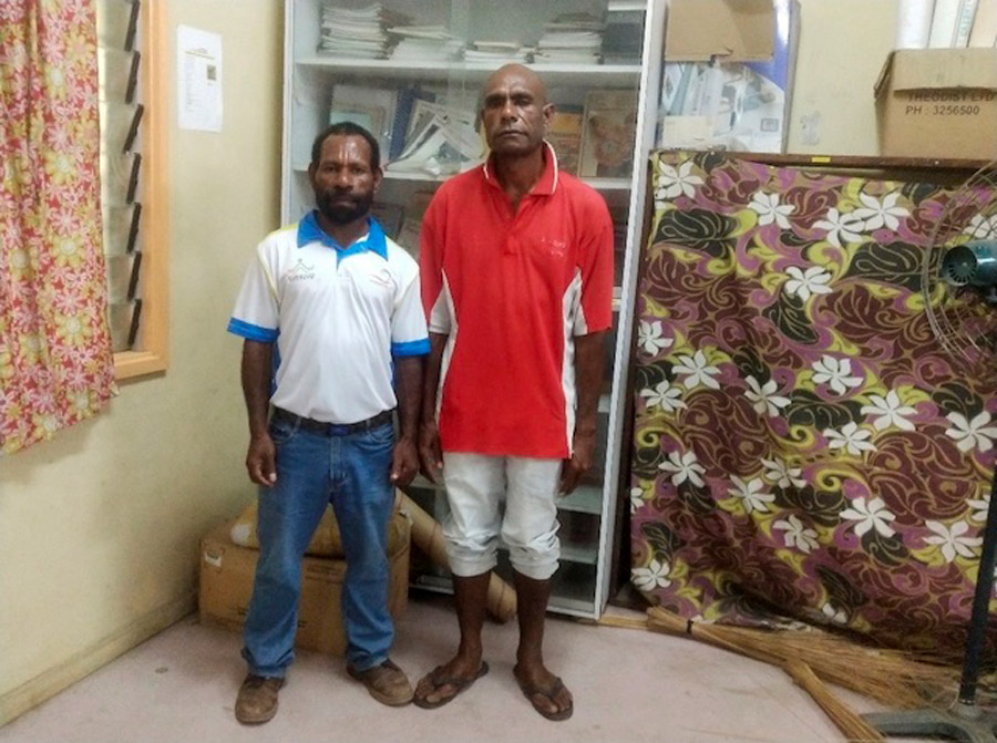 Ahge (R) with his teacher Warren ©Anglicare, PNG