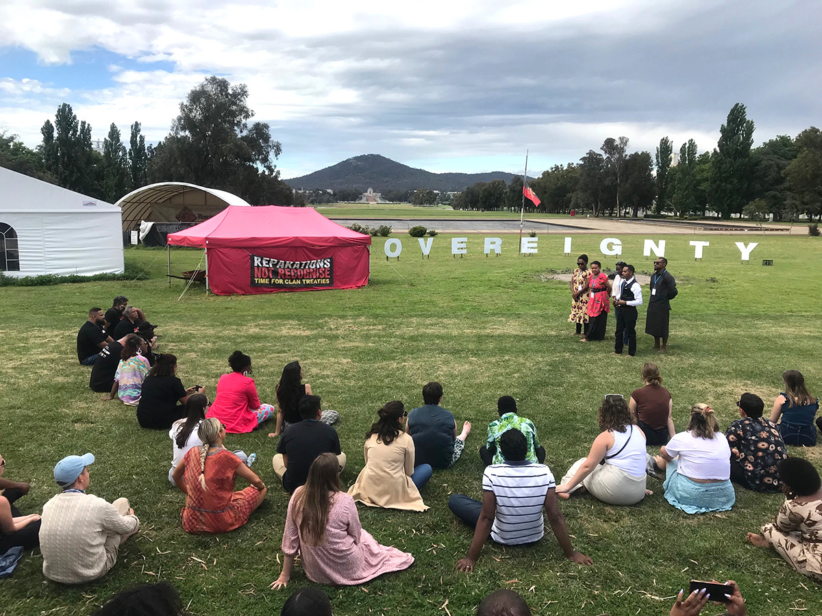 The PNG group pay their respects at the Australian First Nations Tent Embassy © Micah Australia