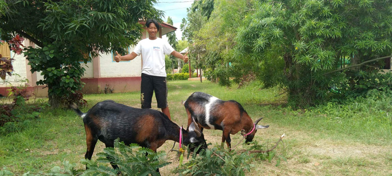Catechist John with his new breeding goats ©CPM