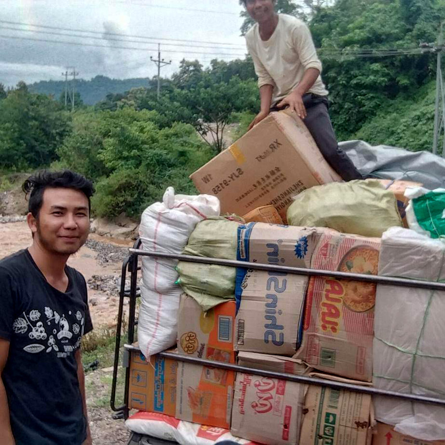 U Saw loads groceries for delivery ©Church of the Province of Myanmar (CPM)