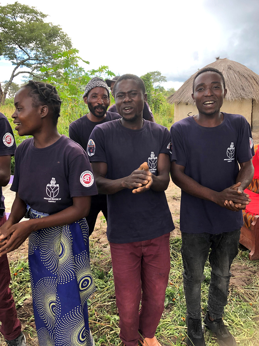 Members of a Gender Action Group which will help the community address gender-based violence. © Julianne Stewart, AID.