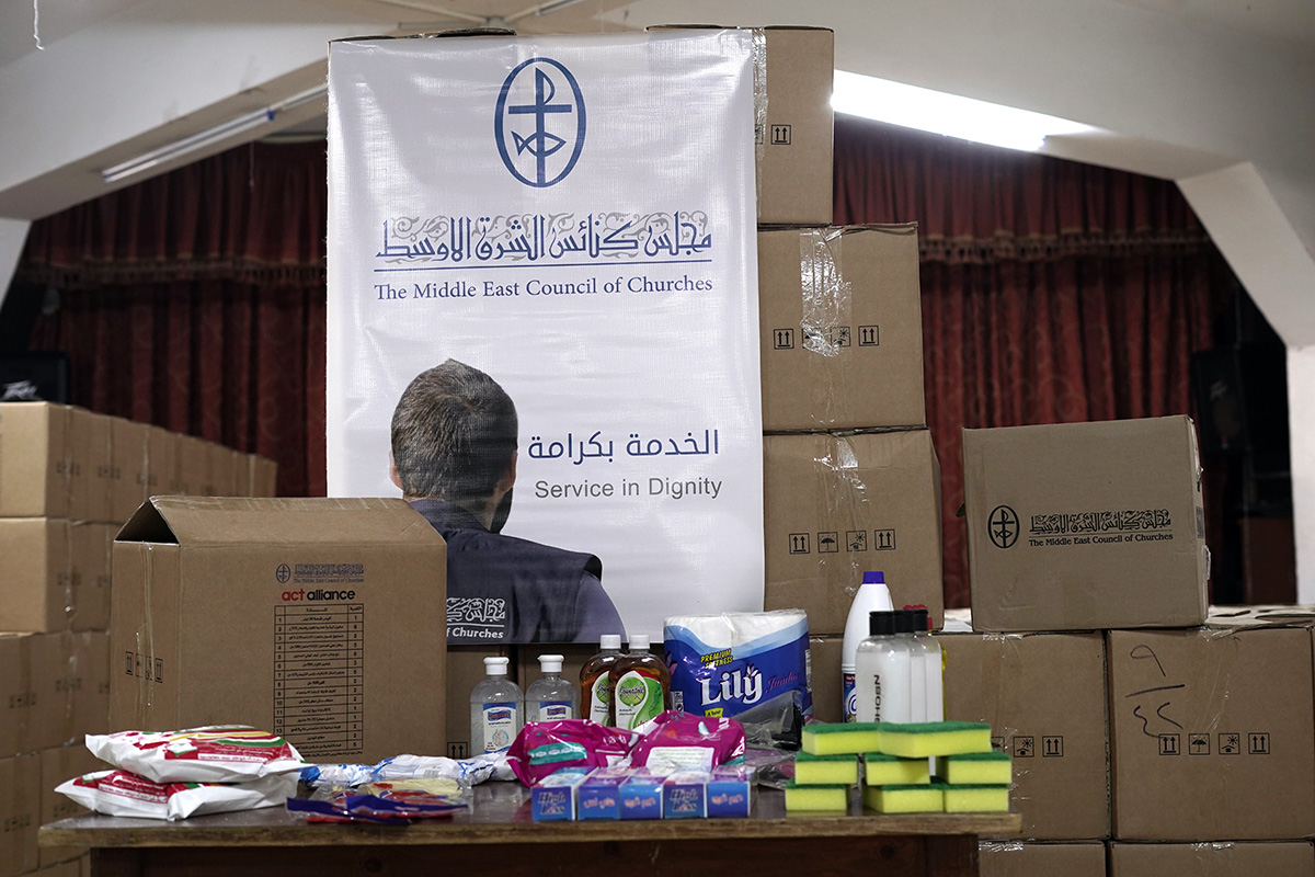 Food packages and hygiene kits ready for distribution. © MECC/ACT Alliance. Used with permission.