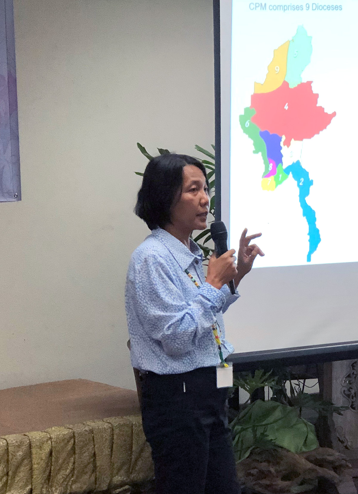 Stella Zin Zin Wah from the Church of the Province of Myanmar makes her presentation at AID’s Partner Conference in June 2023 © Julianne Stewart, AID.