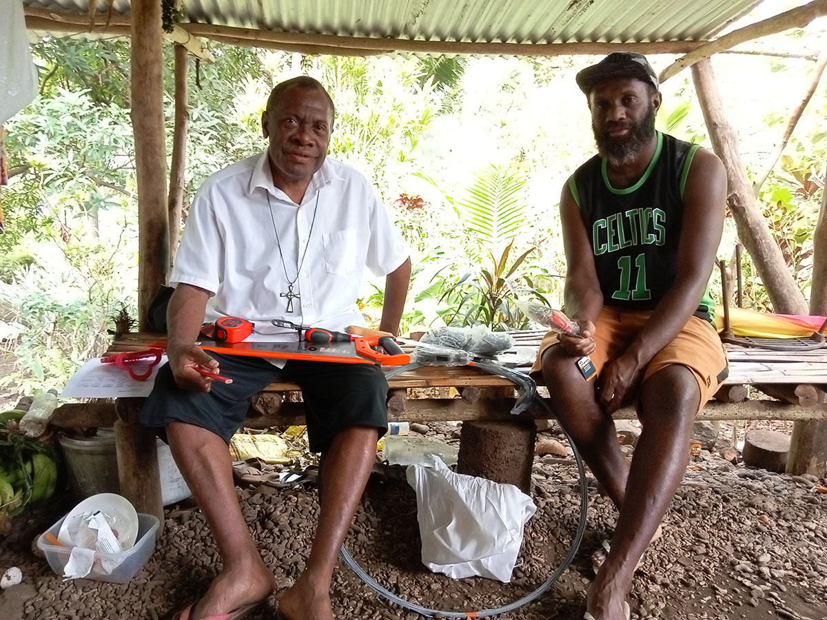 AID’s partner, ACOM Vanuatu, supports rebuilding after Tropical Cyclone Judy earlier this year. © ACOM, Vanuatu. Used with permission.