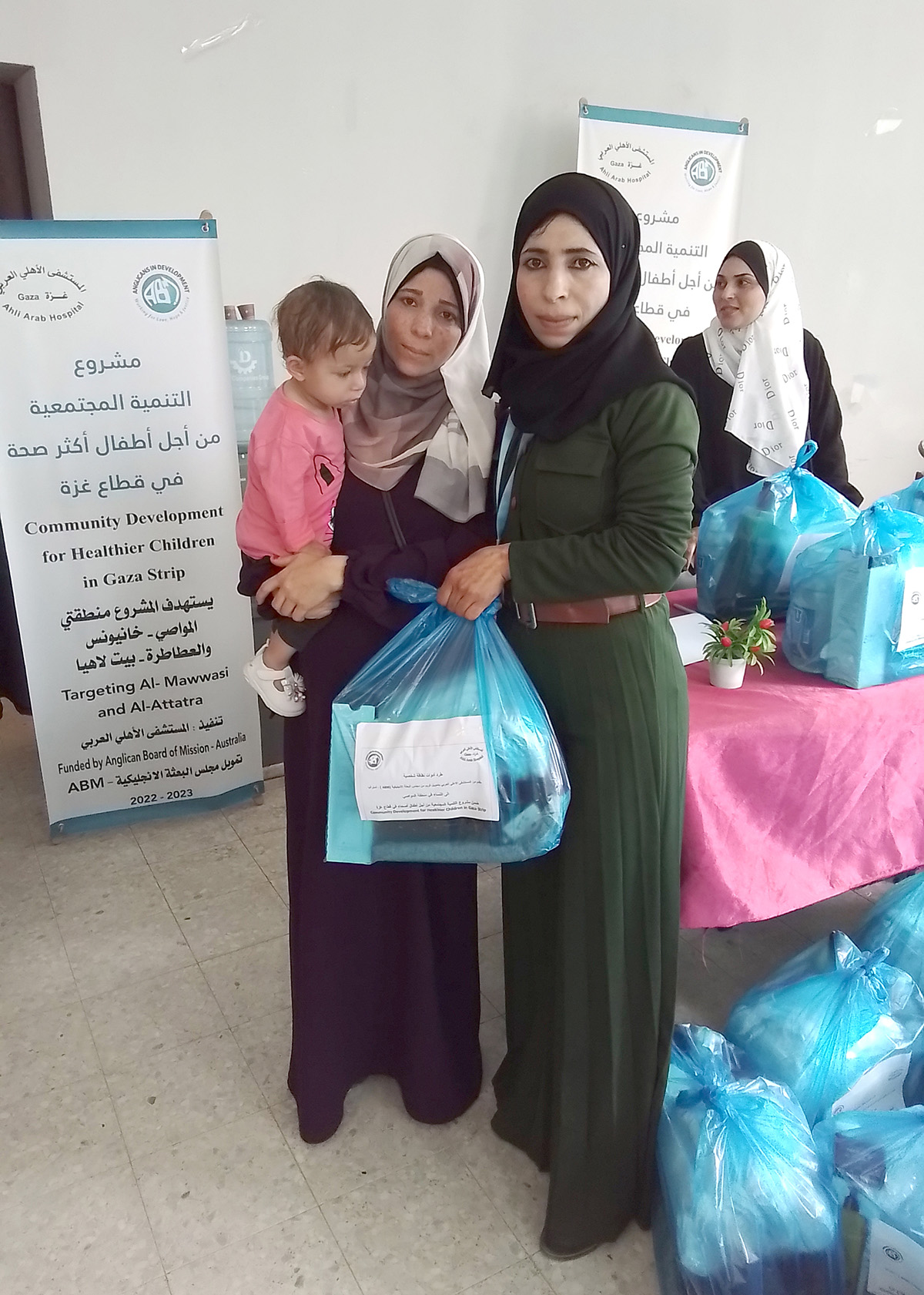 Rayan with Fedaa, the community mobiliser who worked with her on building self-esteem and other skills. © Al-Ahli Hospital, Gaza. Used with permission.