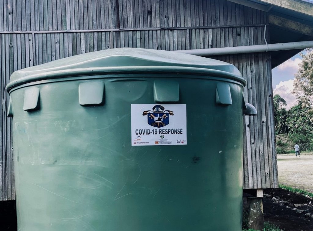 Water tank installed in a Papua New Guinean village as part of the CAN DO supported COVID-19 Response. © Anglicare PNG. Used with permission.
