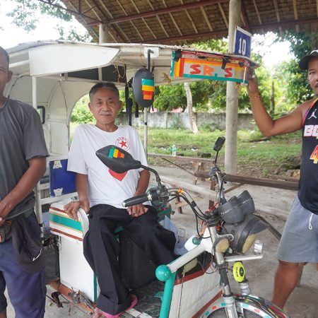 Joel, Ramsy and Joseph drive motorcycle taxis in Toledo city in the Philippines. They supplement their income through home gardening. © IFI-VIMROD. Used with permission.