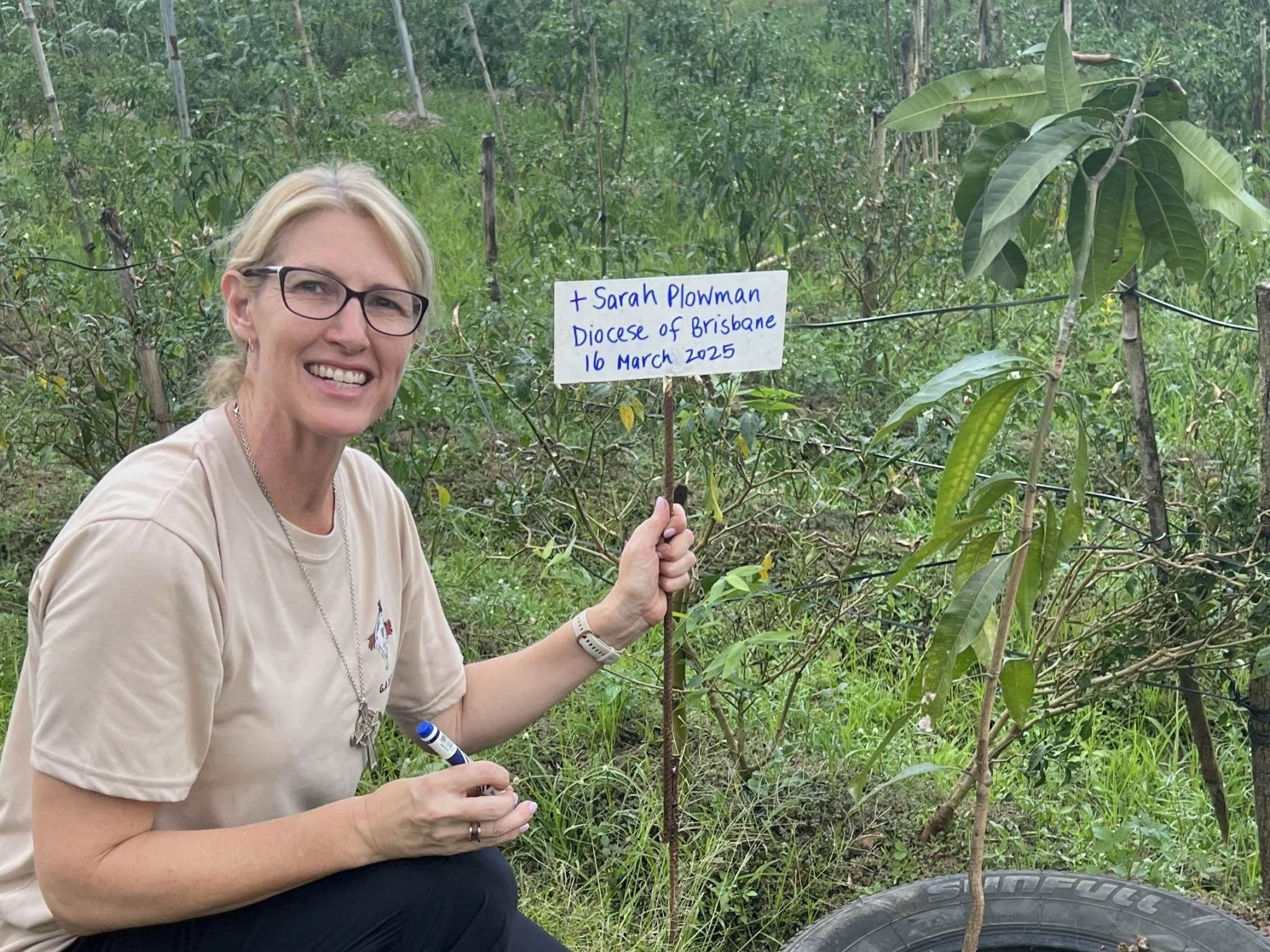 A major focus of E-CARE in the Philippines is creation care, so Bp Sarah was able to add a mango tree to the Communion Forest at the farm at Benguit. A future return visit may be required to sample the fruit of this tree! © Anglican Focus.