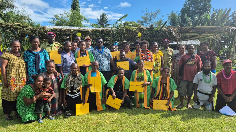 Pride and happiness: Graduates of the Moreguina Literacy School hold up certificates. May 2025, Central Province, Papua New Guinea © ACPNG