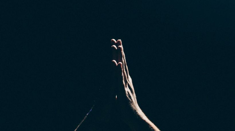 hands praying for peace