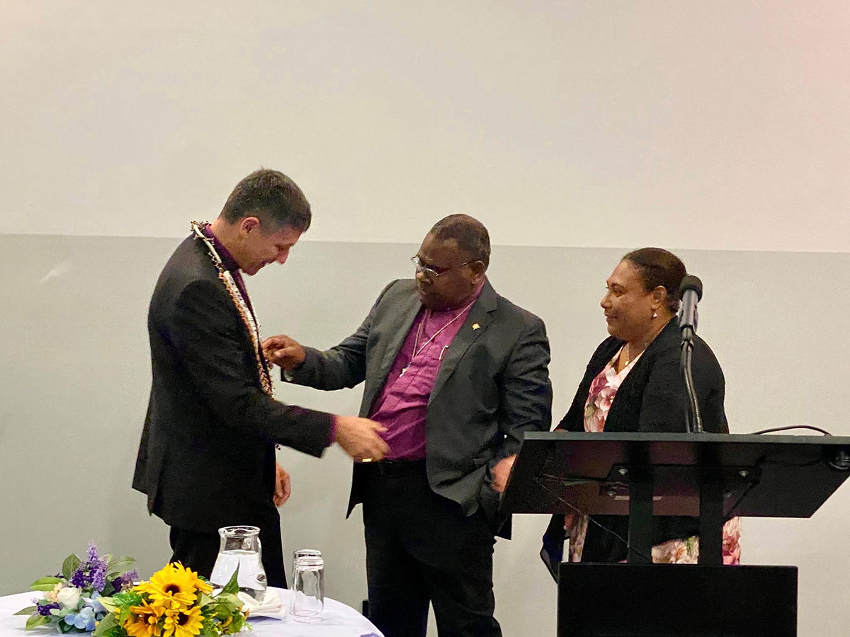 Archbishop Leonard and Dorah presenting Archbishop Jeremy with a ceremonial necklace © St Clements on the Hill, used with permission.