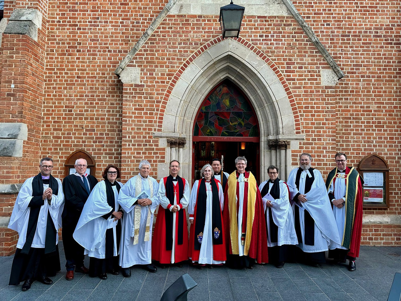 Archbishop Kay (centre) surrounded by Cathedral clergy and the Diocesan Mission Committee after the Evensong commemorating ABM’s 175th anniversary. © Diocese of Perth. Used with permission.