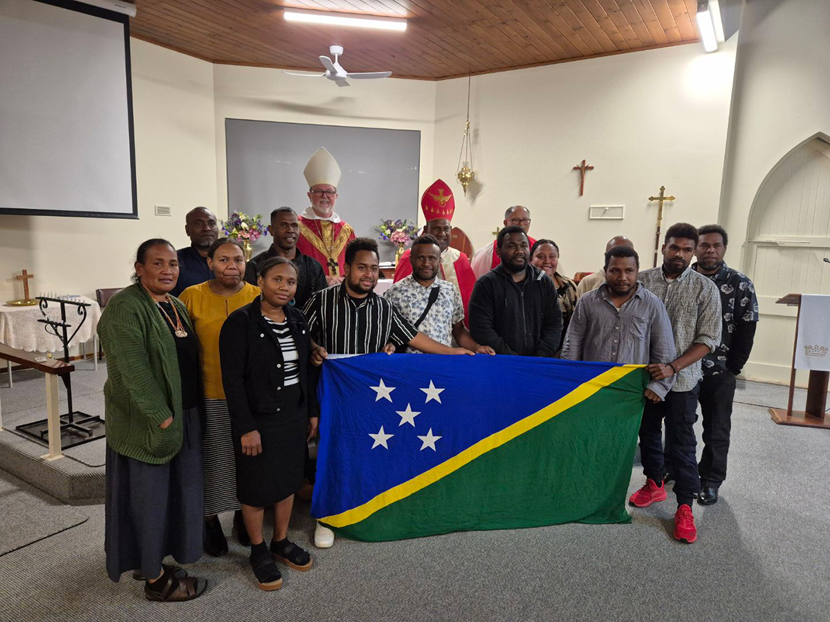Bishops Donald and Rickson (in back row) with Solomon Islanders at the Cobram church