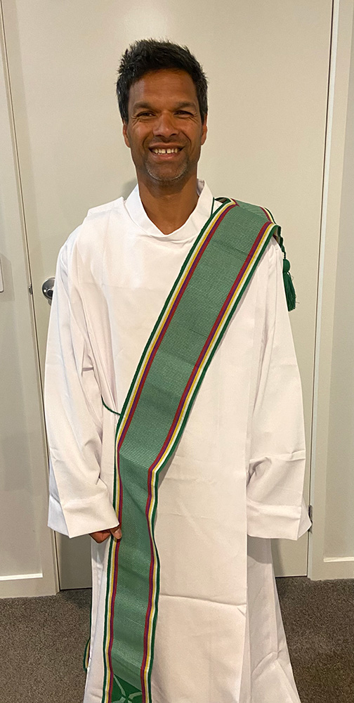 The Rev’d Josh Hasan wearing the stole presented by ABM © supplied.