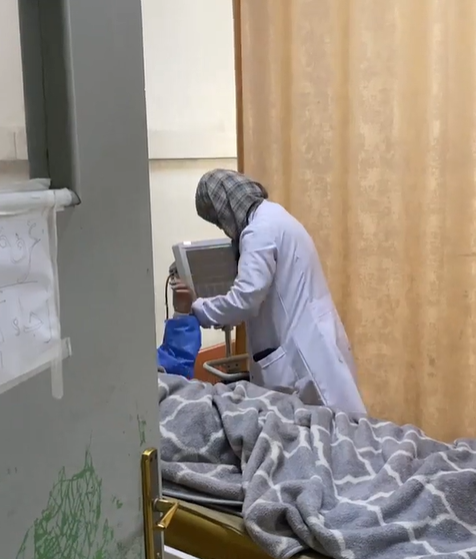 A doctor checks on a patient at Al Ahli Arab Hospital © Diocese of Jerusalem