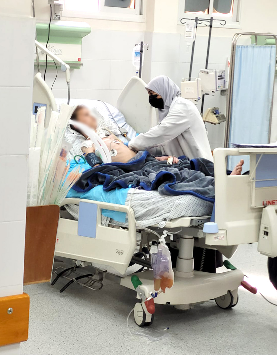 A patient being treated by medical staff at Al Ahli Arab Hospital © Diocese of Jerusalem. Used with permission.